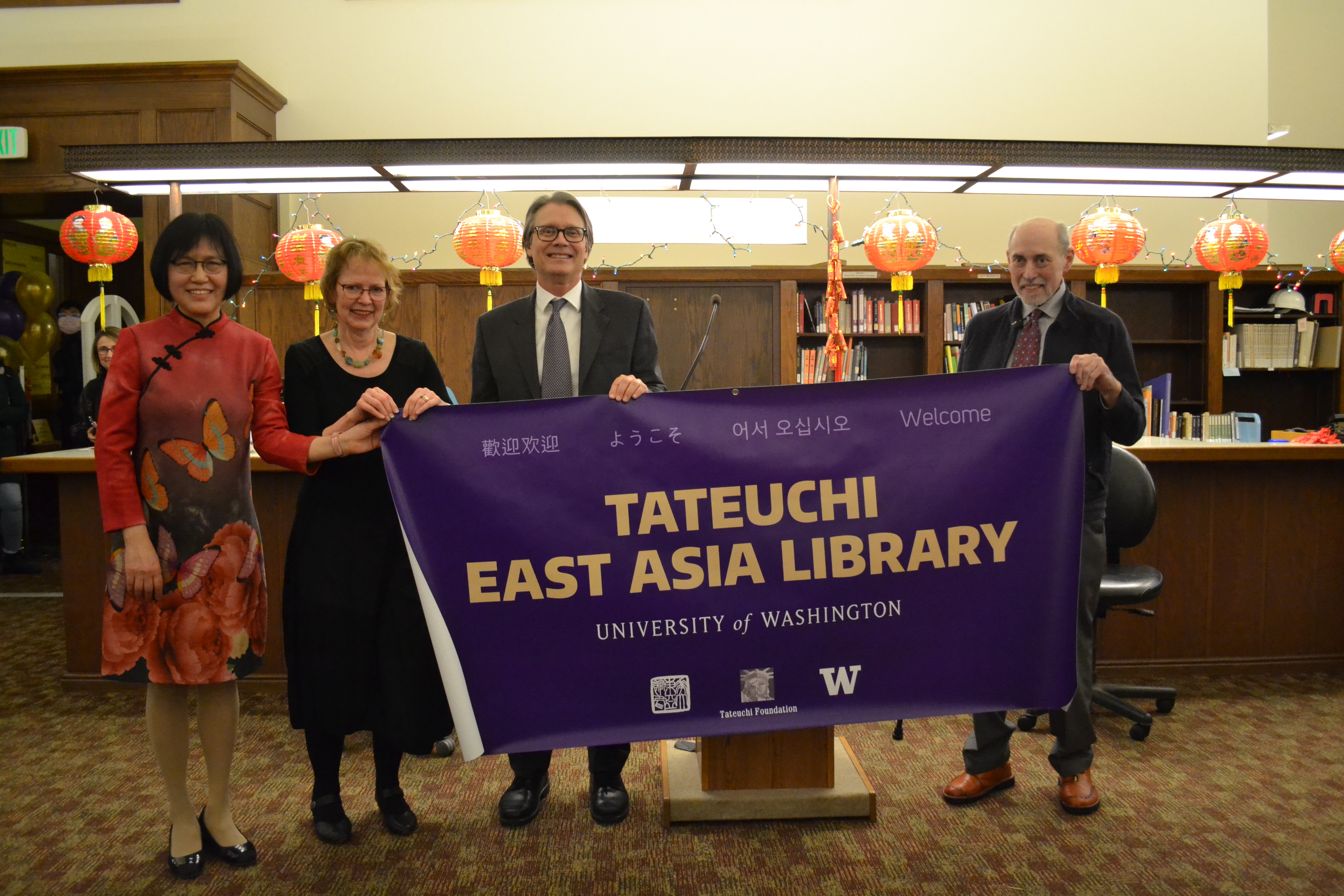 Tateuchi East Asia Library Director Zhijia Shen, Dean of Libraries Betsy Wilson, Provost Mark Richards and Tateuchi Foundation Administrator Dan Asher celebrate the library's new name