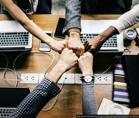 Writing group fist bump