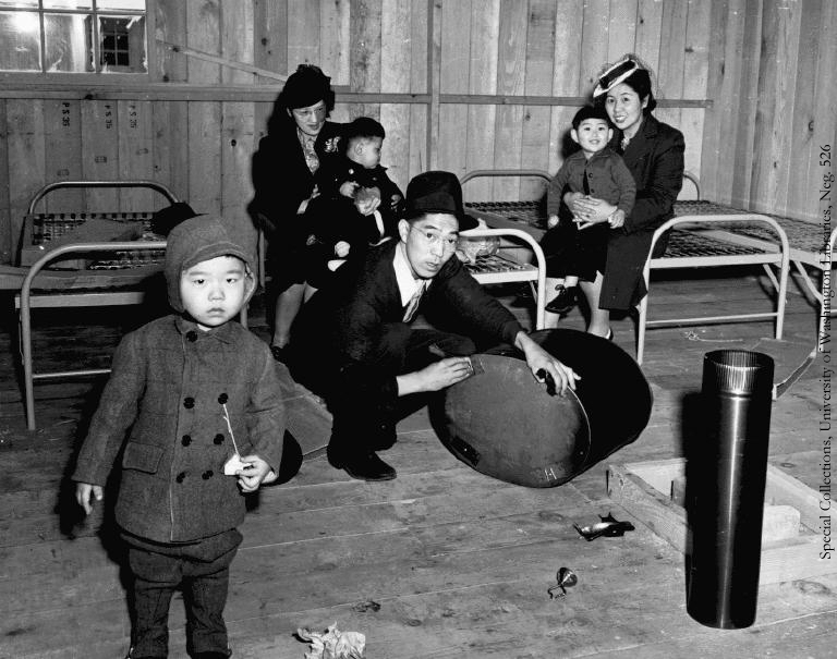 Family in camp "apartment," UW526