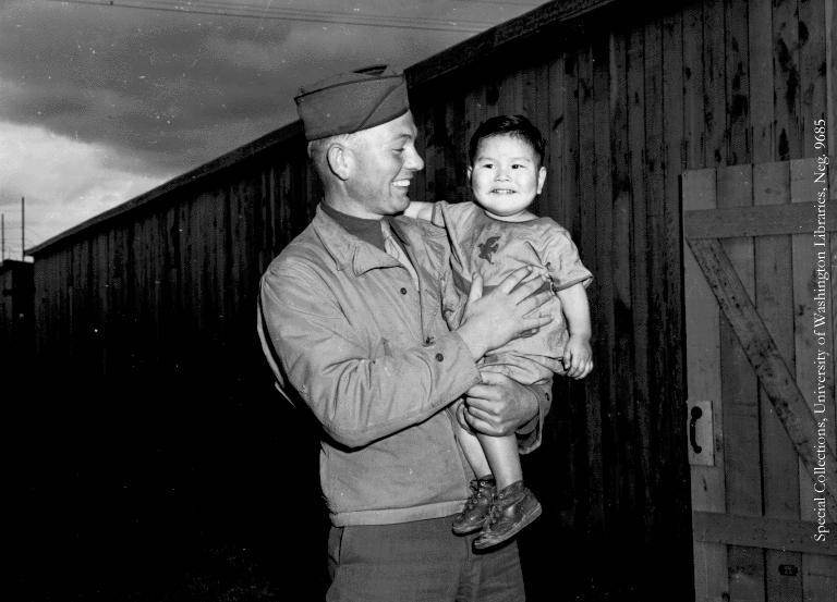 Soldier and child, UW 9685